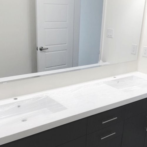 Double sink Vanity Top in Solid White with 2" Enhanced Edge.
