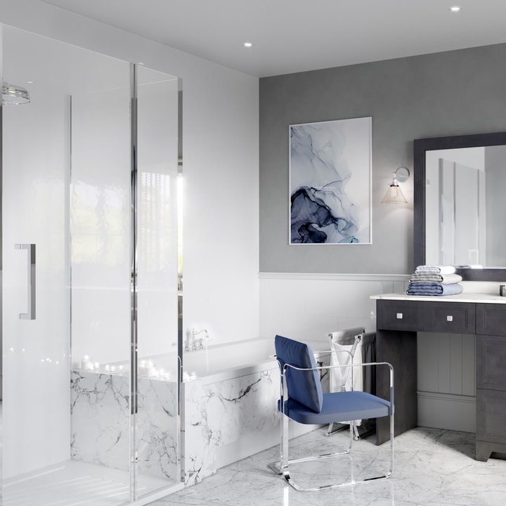 Bathroom with marble bathtub surround, glass shower, and vanity in Kitchener.